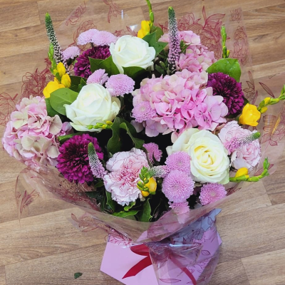 Cherry Blossom - A vibrant pink handtied simply stunning just like it’s inspiration - The Cherry Blossom Tree. Same day flower delivery by local florists - and the Cherry Blossom is a stunning choice.